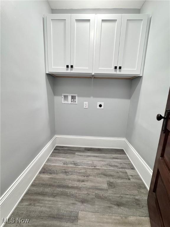 laundry room featuring dark wood finished floors, electric dryer hookup, baseboards, and washer hookup