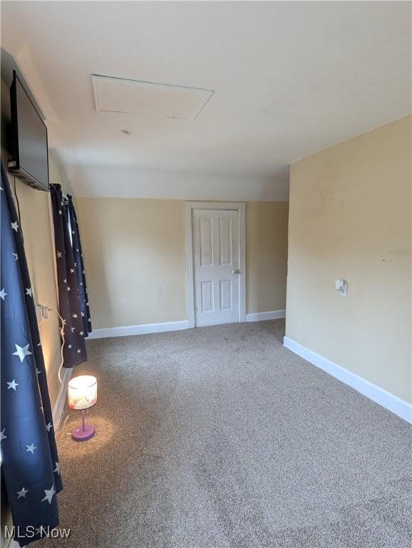 11154 Edgerton Rd, North Royalton, OH 44133 - carpeted empty room featuring attic access and baseboards