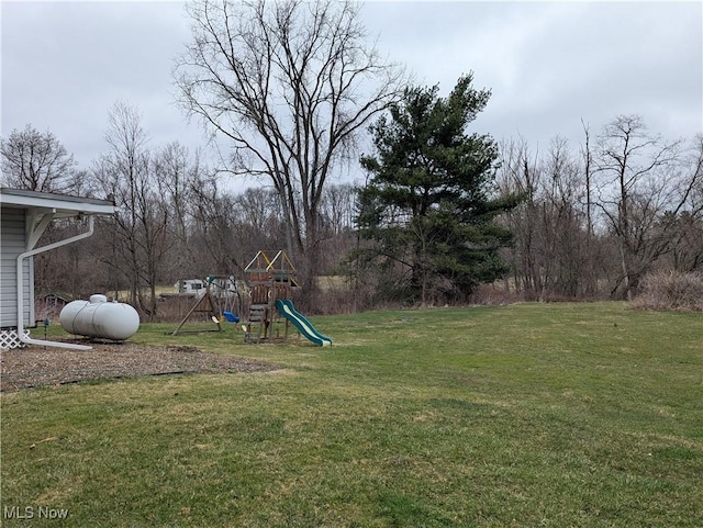 11154 Edgerton Rd, North Royalton, OH 44133 - view of green lawn featuring a playground