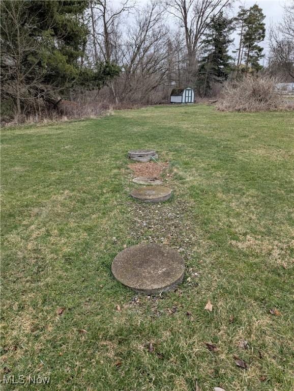 11154 Edgerton Rd, North Royalton, OH 44133 - view of grassy yard with a shed