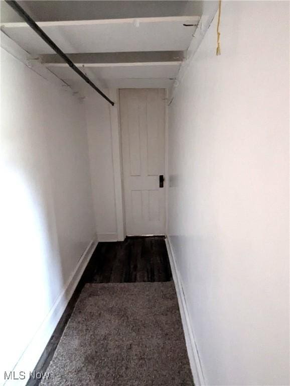 11154 Edgerton Rd, North Royalton, OH 44133 - corridor with baseboards and dark wood finished floors