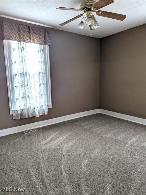 11154 Edgerton Rd, North Royalton, OH 44133 - empty room with carpet flooring and a ceiling fan
