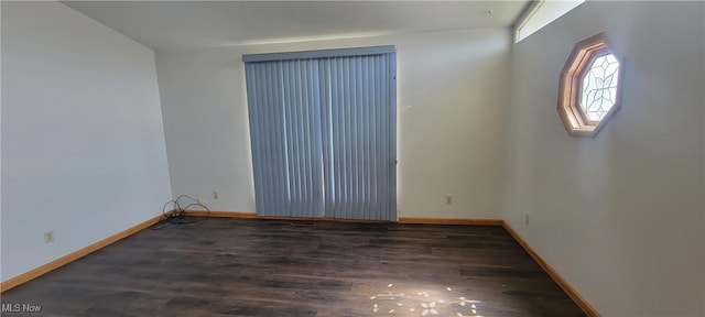 712 Circle Dr, Belpre, OH 45714 - unfurnished room with baseboards and wood finished floors
