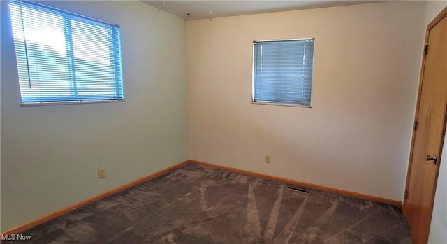 712 Circle Dr, Belpre, OH 45714 - carpeted spare room featuring baseboards and visible vents