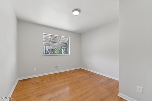 6372 Tanglewood Ln, Seven Hills, OH 44131 - spare room featuring light wood-type flooring and baseboards