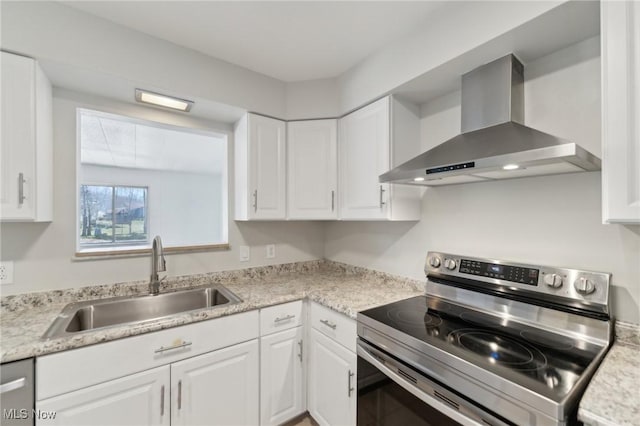 6372 Tanglewood Ln, Seven Hills, OH 44131 - kitchen with wall chimney range hood, stainless steel appliances, a sink, and white cabinetry