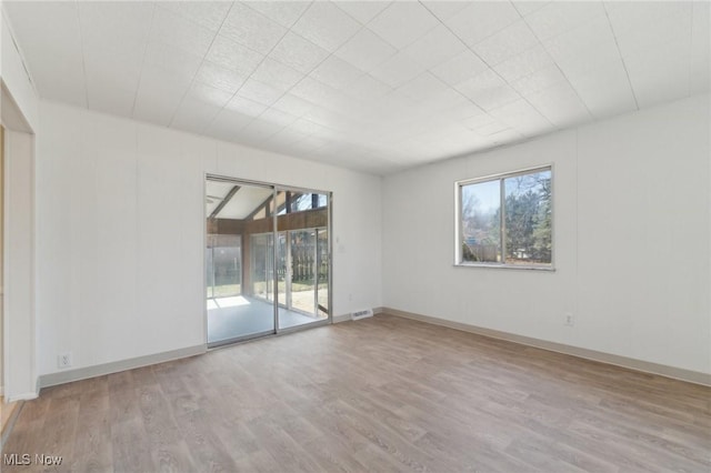 6372 Tanglewood Ln, Seven Hills, OH 44131 - spare room featuring wood finished floors and baseboards