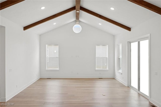 8933 Camden Rd NW, Massillon, OH 44646 - unfurnished living room with light wood finished floors and recessed lighting