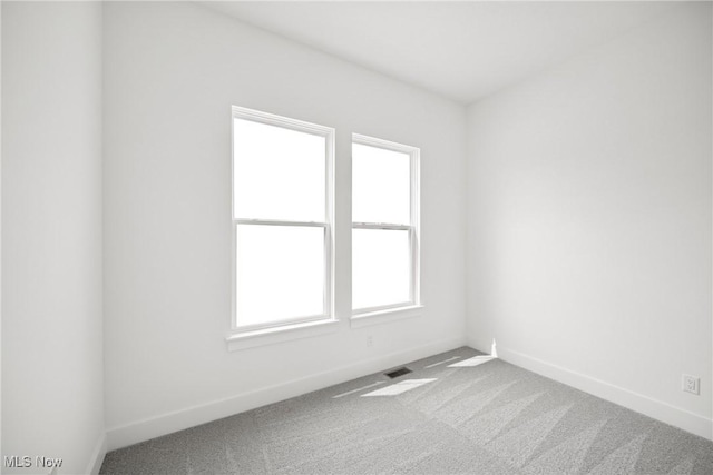 8933 Camden Rd NW, Massillon, OH 44646 - spare room with carpet flooring and baseboards