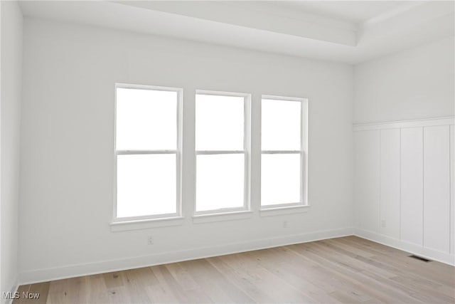 8933 Camden Rd NW, Massillon, OH 44646 - empty room with light wood finished floors and baseboards