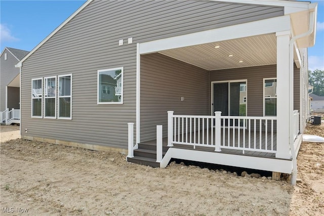 8933 Camden Rd NW, Massillon, OH 44646 - rear view of house featuring a wooden deck