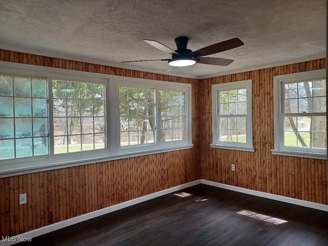 unfurnished sunroom featuring visible vents