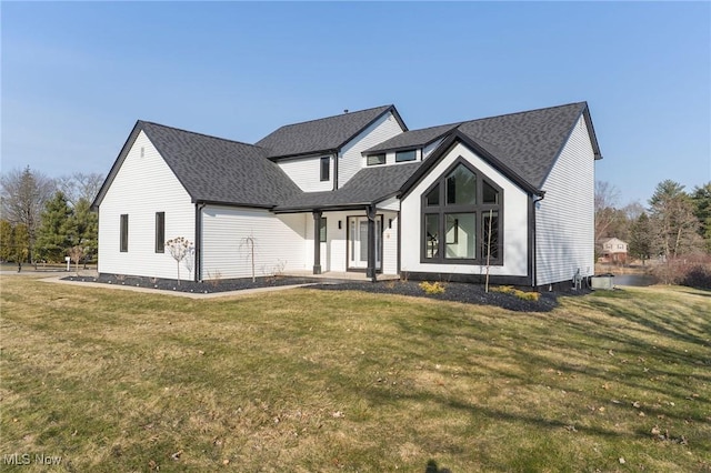 3189 Chardonnay Ln, Poland, OH 44514 - modern farmhouse with a shingled roof and a front lawn