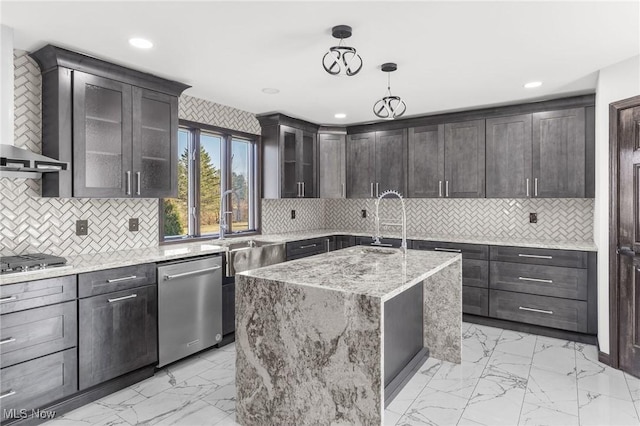 3189 Chardonnay Ln, Poland, OH 44514 - kitchen featuring a sink, wall chimney range hood, marble finish floor, and stainless steel appliances