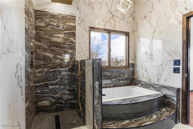 3189 Chardonnay Ln, Poland, OH 44514 - full bathroom with a garden tub and a marble finish shower