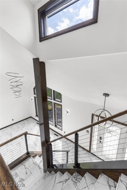 3189 Chardonnay Ln, Poland, OH 44514 - stairway featuring marble finish floor