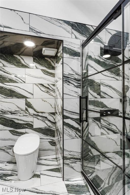 3189 Chardonnay Ln, Poland, OH 44514 - bathroom with toilet and a marble finish shower