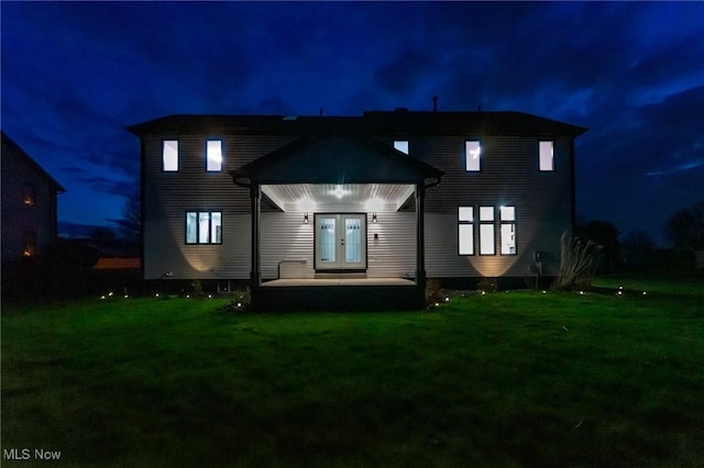 3189 Chardonnay Ln, Poland, OH 44514 - view of front facade featuring a yard, french doors, and a patio