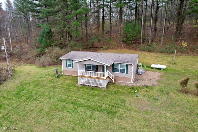 view of front facade with a porch and a front yard