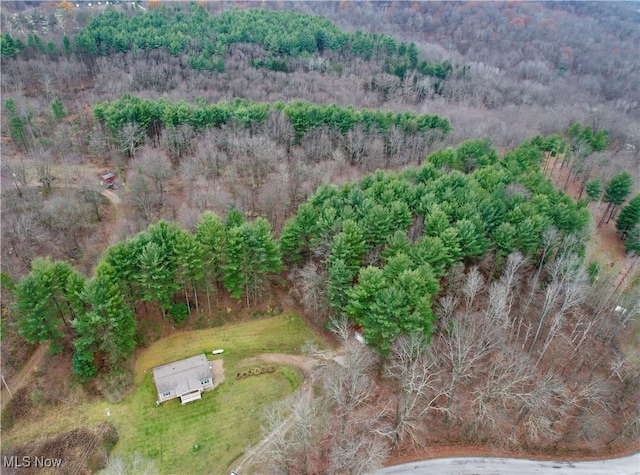 bird's eye view featuring a forest view
