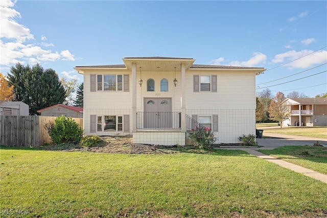 507 Stone Rd, Belpre, OH 45714 - split foyer home with fence and a front lawn