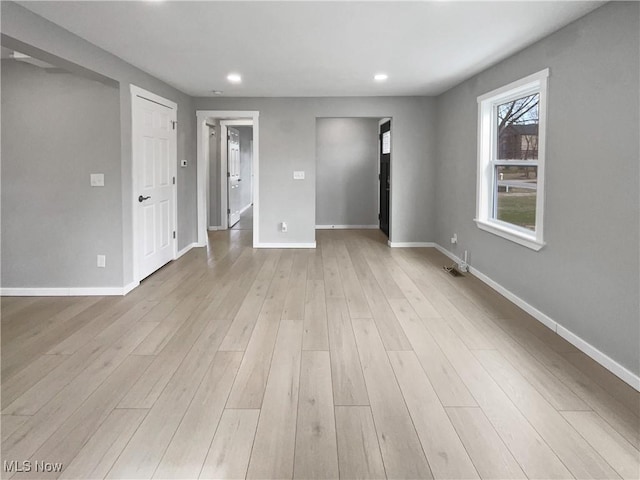 8414 York Rd, North Royalton, OH 44133 - spare room with recessed lighting, light wood-type flooring, and baseboards