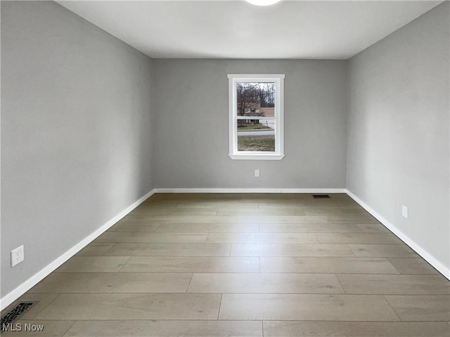 8414 York Rd, North Royalton, OH 44133 - unfurnished room with visible vents, wood finished floors, and baseboards