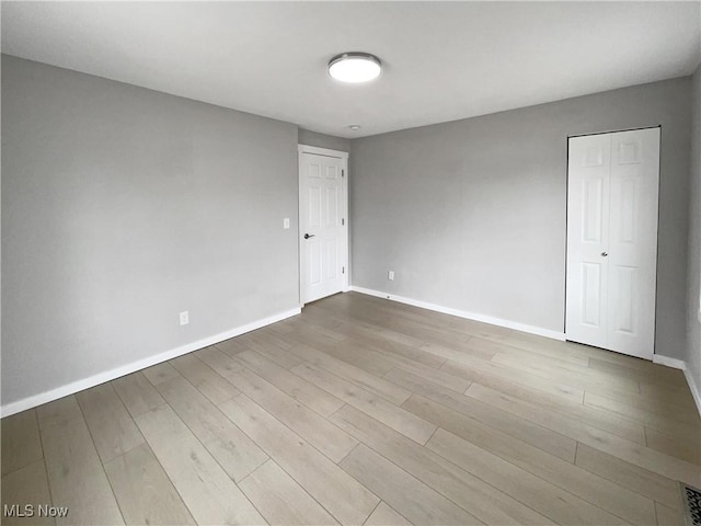 8414 York Rd, North Royalton, OH 44133 - spare room with wood finished floors and baseboards