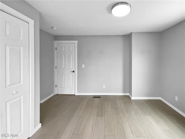 8414 York Rd, North Royalton, OH 44133 - spare room with visible vents, wood finished floors, and baseboards