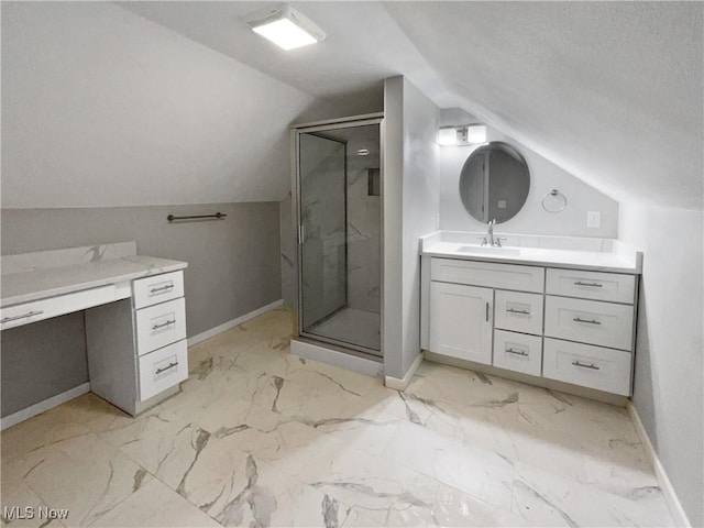 8414 York Rd, North Royalton, OH 44133 - bathroom featuring baseboards, vaulted ceiling, vanity, and a marble finish shower