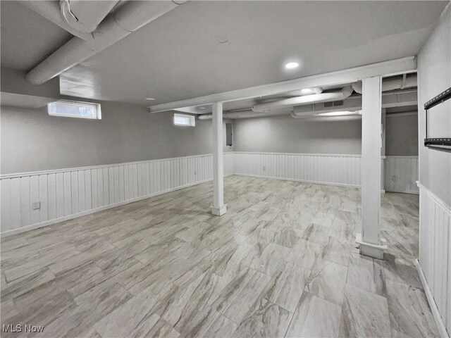 8414 York Rd, North Royalton, OH 44133 - below grade area with wainscoting, electric panel, and recessed lighting