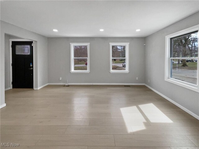 8414 York Rd, North Royalton, OH 44133 - unfurnished room with baseboards, light wood-type flooring, and recessed lighting