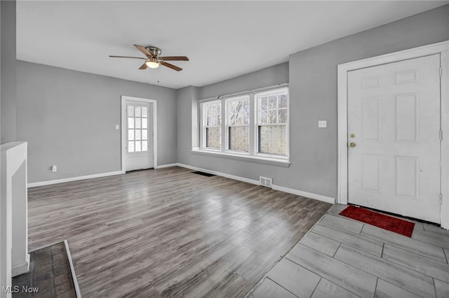 11504 E Blvd, Cleveland, OH 44105 - entrance foyer featuring visible vents, baseboards, a ceiling fan, and wood finished floors
