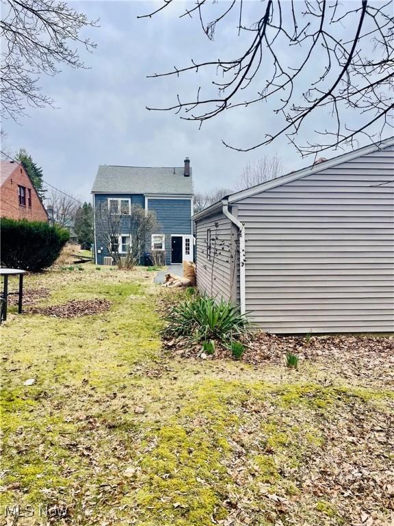 1655 Ivydale Rd, Cleveland Heights, OH 44118 - back of property featuring a yard