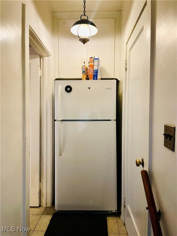 1655 Ivydale Rd, Cleveland Heights, OH 44118 - interior space featuring light tile patterned floors and freestanding refrigerator