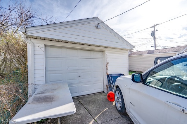7115 Laverne Ave, Parma, OH 44129 - detached garage featuring driveway