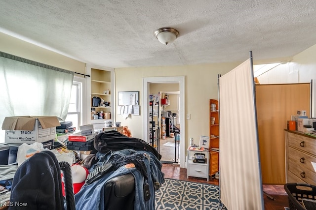 7115 Laverne Ave, Parma, OH 44129 - bedroom with a textured ceiling and wood finished floors