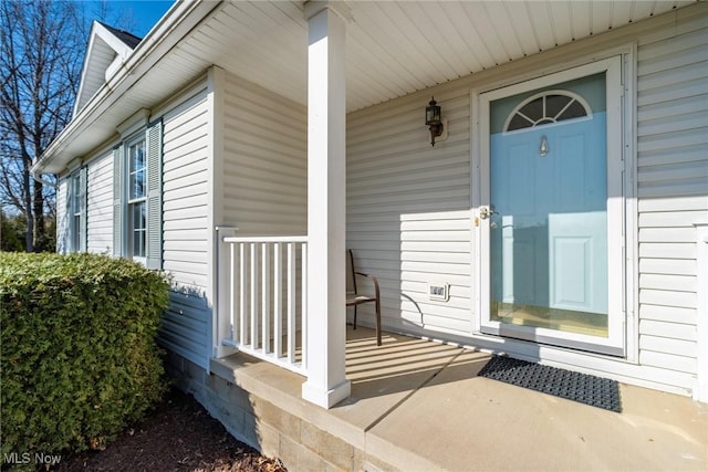 doorway to property with covered porch