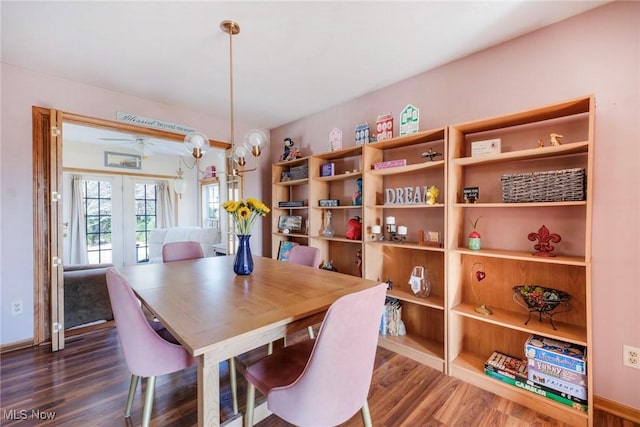 dining room with wood finished floors