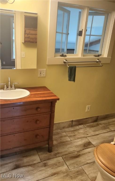 6846 Wakefield, Hiram, OH 44234 - half bath featuring vanity and toilet