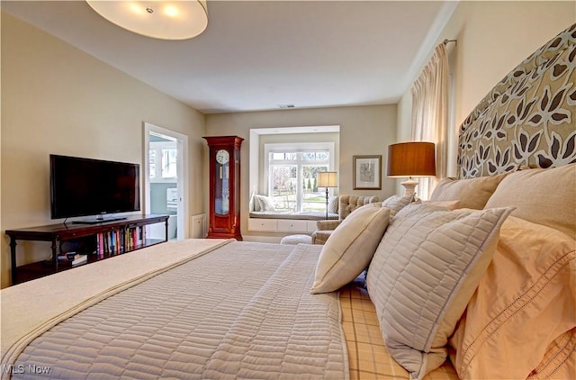 bedroom with visible vents