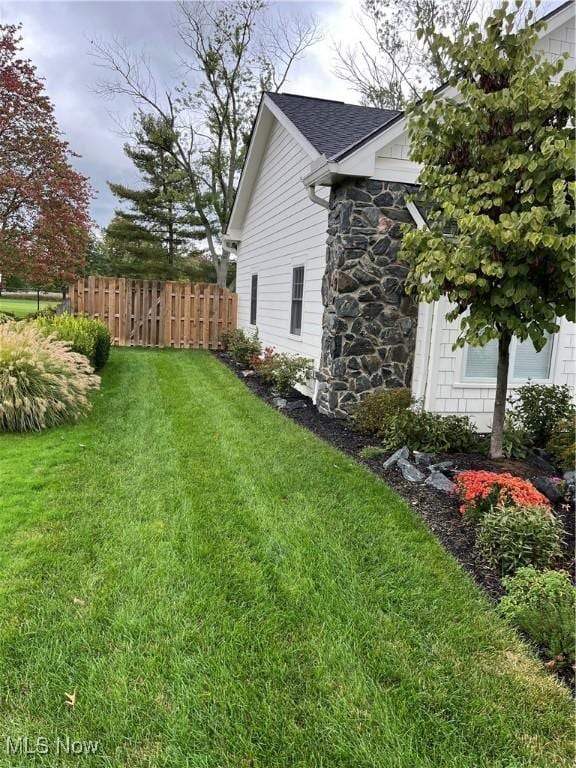 view of yard featuring fence