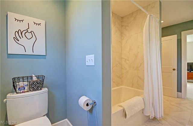 full bath with shower / tub combo and toilet