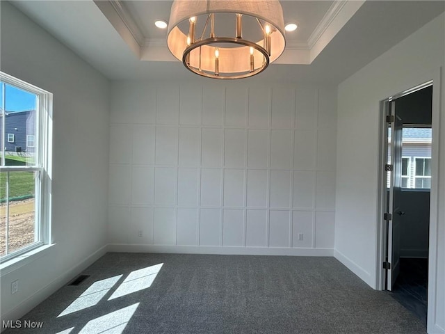 8929 Camden Rd NW, Massillon, OH 44646 - spare room featuring ornamental molding, carpet floors, a chandelier, a tray ceiling, and recessed lighting