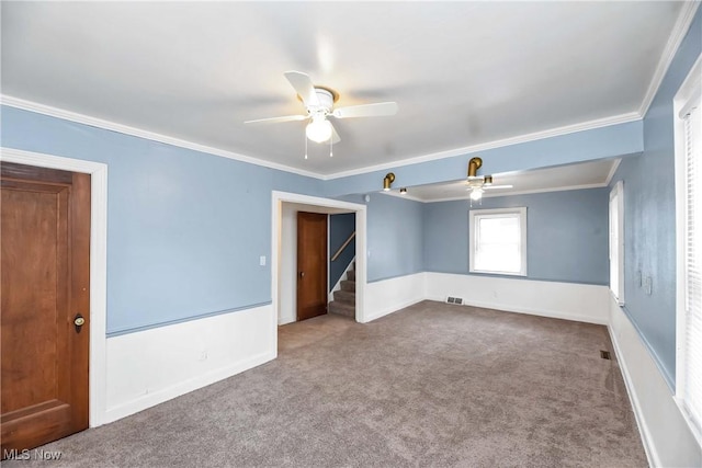 3716 E 52nd St, Cleveland, OH 44105 - empty room with carpet flooring, ceiling fan, visible vents, and ornamental molding