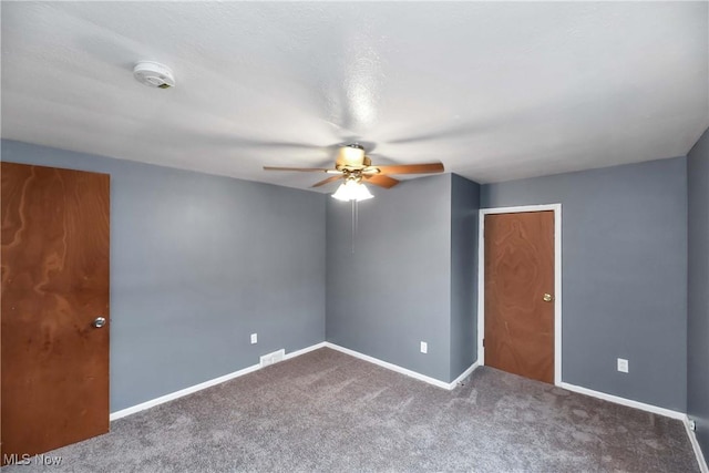 3716 E 52nd St, Cleveland, OH 44105 - carpeted spare room featuring a ceiling fan, baseboards, and visible vents