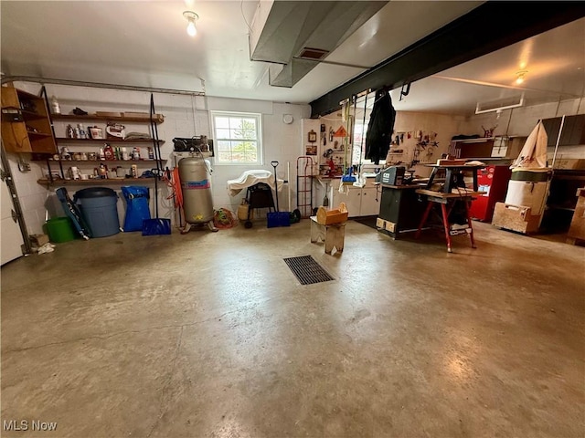 below grade area with a workshop area and a garage