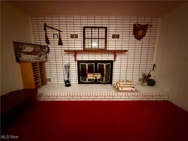 room details with a tiled fireplace