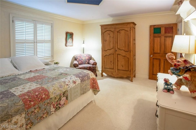 bedroom with ornamental molding, baseboards, and light colored carpet