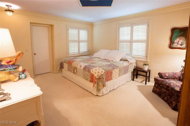 carpeted bedroom featuring ornamental molding